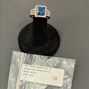 Elegant Blue Sapphire Ring with White Accents